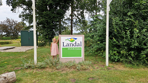 Girl at the sign of Landal PUUR Exloo
