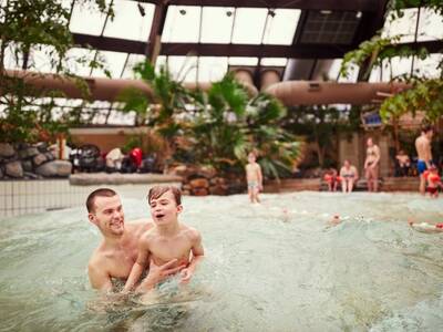 Brave the waves in the wave pool of the Aqua Mundo in Center Parcs De Huttenheugte