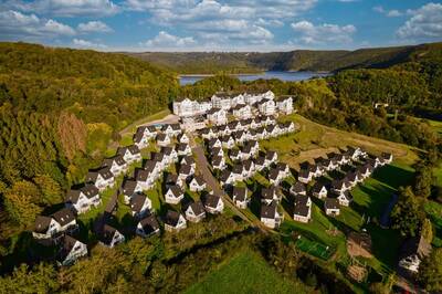 Aerial view of the Dormio Eifeler Tor holiday park in the woods and hills