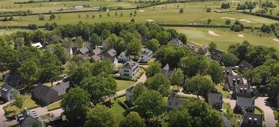 Aerial view of holiday park Dormio Resort Maastricht and the hills of South Limburg