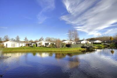 Chalets on the water at holiday park EuroParcs Buitenhuizen