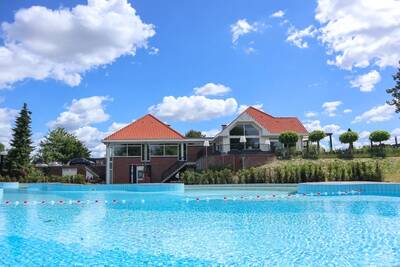 The outdoor pool of holiday park EuroParcs Marina Strandbad