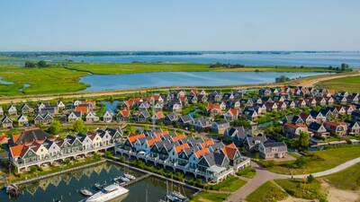 Aerial view of the EuroParcs Poort van Amsterdam holiday park on the Markermeer