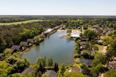Aerial view of the EuroParcs de Achterhoek holiday park with the recreational lake and holiday homes