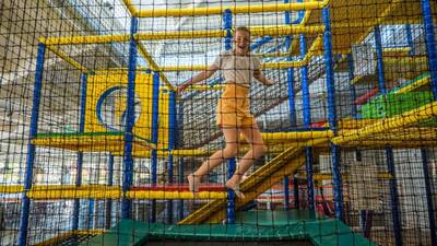 Girl playing in the indoor playground of holiday park Europarcs de Achterhoek