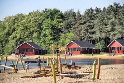 Playground and holiday homes at 't Smokkelstrand at holiday park RCN de Flaasbloem