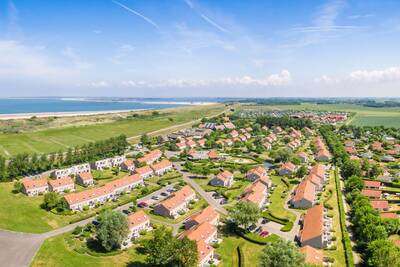 Aerial photo of the Roompot De Soeten Haert holiday park and the North Sea beach