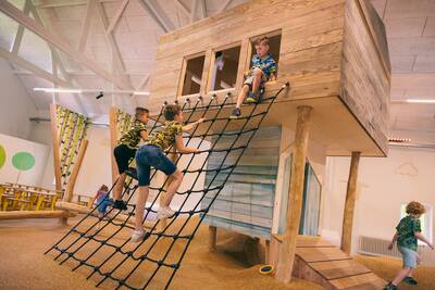 Children play in the indoor playground at the Roompot Klein Vink holiday park