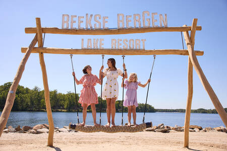 Children on play equipment in a playground at Lake Resort Beekse Bergen