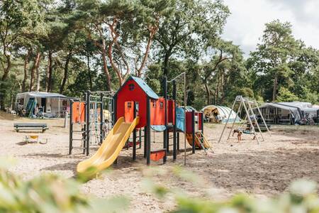 A playground at a camping field at holiday park Beerze Bulten