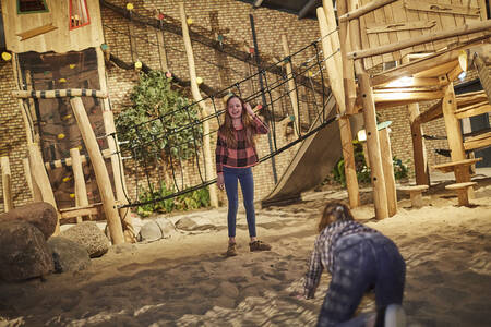 Children play in La Selva indoor playground at holiday park Buitenhof de Leistert