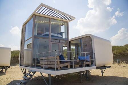 Spend the night on the beach in a beach house at Camping Zonneweelde