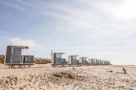 Enjoy the night on the beach of Nieuwvliet-Bad in one of the beach houses at Camping Zonneweelde