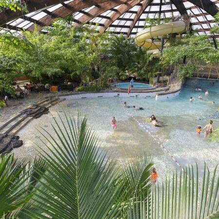 The wave pool in the subtropical swimming pool of holiday park de Huttenheugte