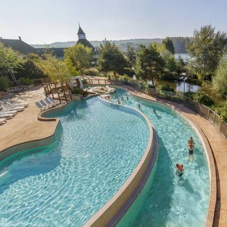 Soak up the sun in the outdoor pool of the Aqua Mundo in Center Parcs Le Lac d'Ailette