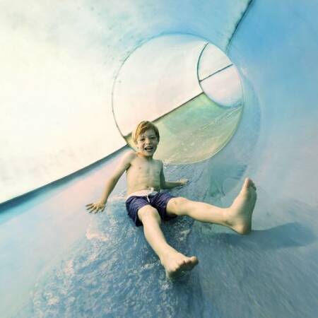 Ride down the slide in the Aqua Mundo of Center Parcs Limburgse Peel