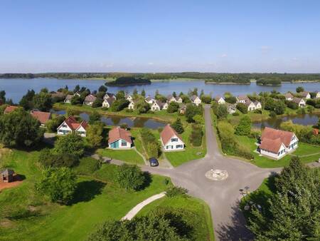 Aerial view of holiday homes and the recreational lake of Center Parcs Parc Sandur
