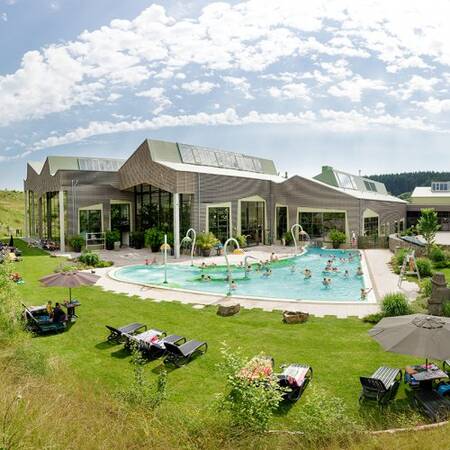 Outdoor pool with sunbathing area of the Aqua Mundo at Center Parcs Park Bostalsee