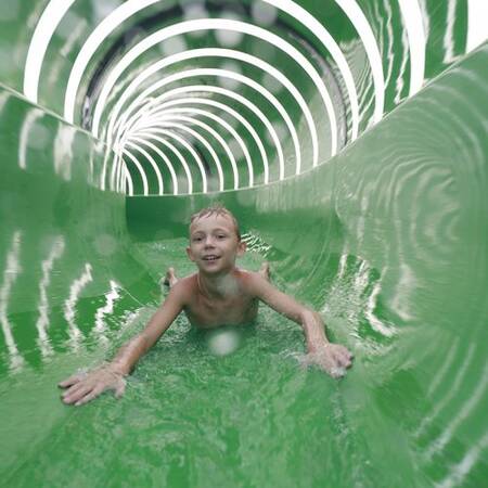 Super long water slide in the Aqua Mundo swimming pool at Center Parcs Park Zandvoort