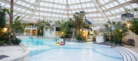 The wave pool of the Aqua Mundo swimming paradise of Center Parcs Park de Haan