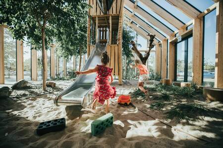 Slide in the indoor playground at De Klepperstee holiday park