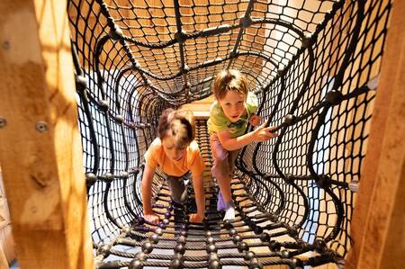 Children playing in the indoor playground of the Dormio Eifeler Tor holiday park