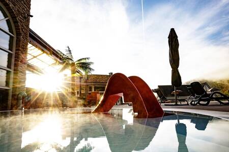 Slide in the paddling pool outside at the Dormio Eifeler Tor holiday park