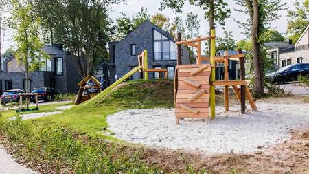 Playground between luxury holiday homes at the Dormio Resort Maastricht holiday park