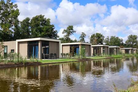 Chalets with a garden on the water at holiday park EuroParcs Buitenhuizen