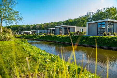 Holiday homes on a ditch at the EuroParcs Buitenhuizen holiday park