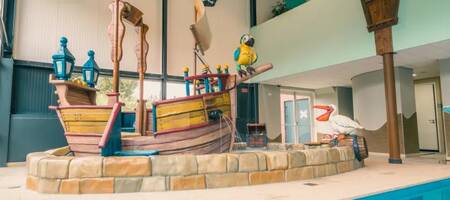 Playground equipment in the indoor pool of holiday park EuroParcs De Biesbosch