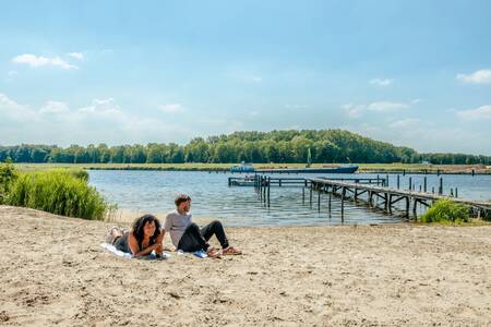 Beach and jetty on the Reevemeer at holiday park EuroParcs De IJssel Eilanden