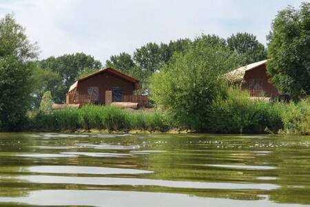 Lodge tents on the IJsselmeer at the EuroParcs Enkhuizer Strand holiday park