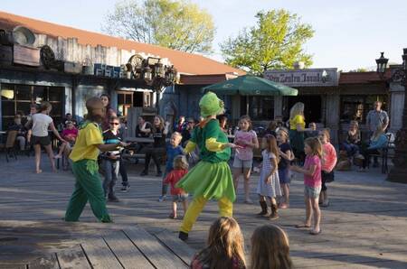 Children at the entertainment program at holiday park EuroParcs Limburg