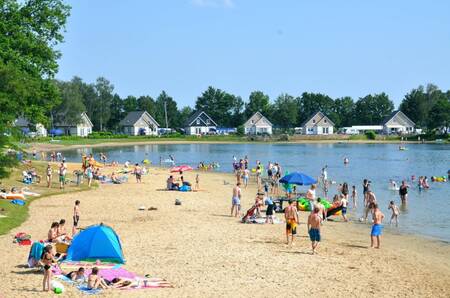 Beach on the recreational lake of holiday park EuroParcs Limburg