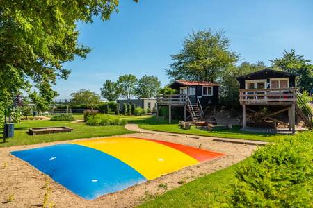 Playground with air trampoline at holiday park EuroParcs Marina Strandbad