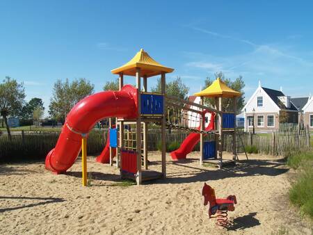 Play equipment in a playground at the EuroParcs Poort van Amsterdam holiday park