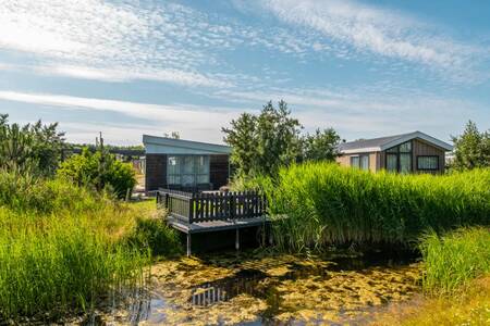 Holiday home on the water at holiday park EuroParcs Poort van Zeeland