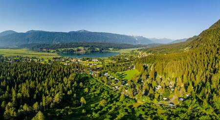 Aerial view of EuroParcs Pressegger See holiday park, mountains and forests