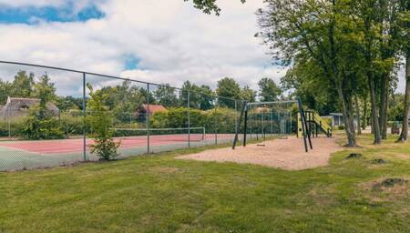 Playground next to the tennis court at EuroParcs Reestervallei holiday park