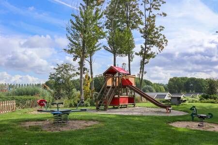 Play equipment in the playground at the EuroParcs Spaarnwoude holiday park