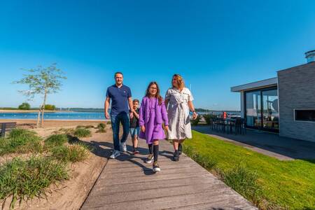 Family walks through the EuroParcs Veluwemeer holiday park