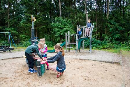 Children play in the playground of holiday park EuroParcs de Wiltzangh