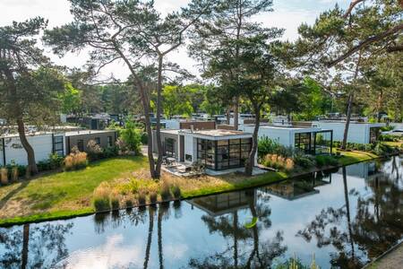 Chalets on the water at holiday park EuroParcs de Zanding