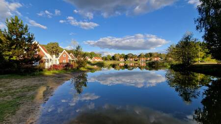 Holiday homes and beach at the lake at the EuroParcs de Zanding holiday park