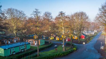 Colorful chalets in lanes at the Europarcs Het Amsterdamse Bos holiday park