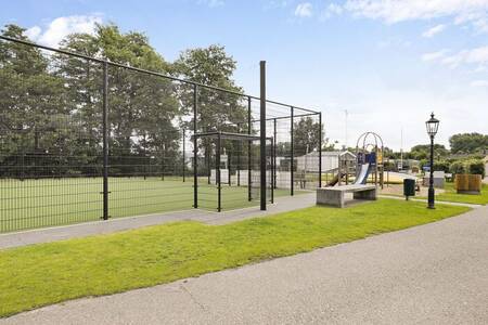 The football field with artificial grass at the Familiehuis Nunspeet holiday park