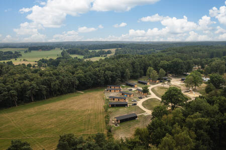 Aerial view of holiday homes on holiday park Wilsumer Berge and the surrounding forest