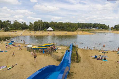 The large lake with slides and sandy beach at holiday park Wilsumer Berge