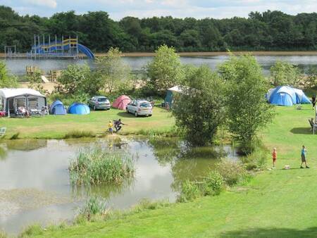 Caravans and tents on a camping field at holiday park Witterzomer